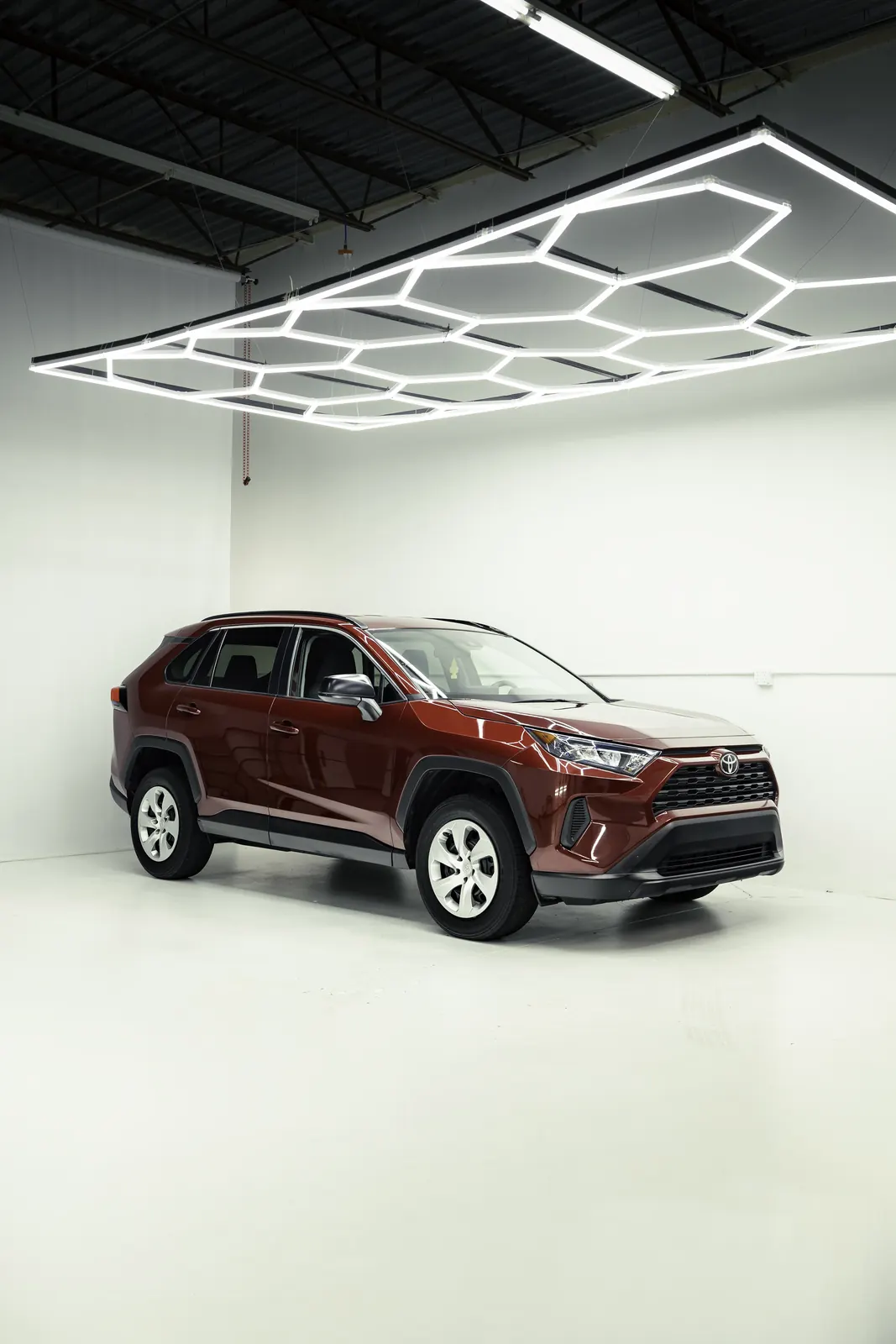 Ceramic-coated red Toyota RAV4 in the studio