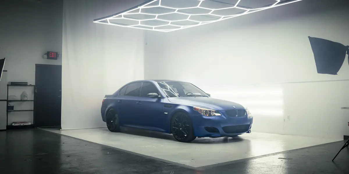 Matte blue BMW M5 in the 355 Auto Spa studio