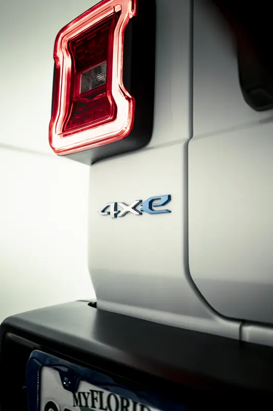 Jeep 4xe badge and taillight on glossy white paint