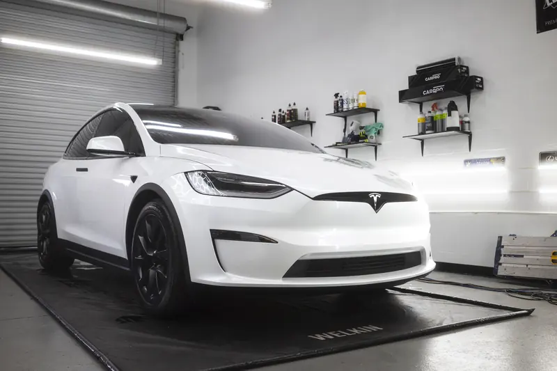 White Tesla Model X Plaid finished in the 355 Auto Spa bay