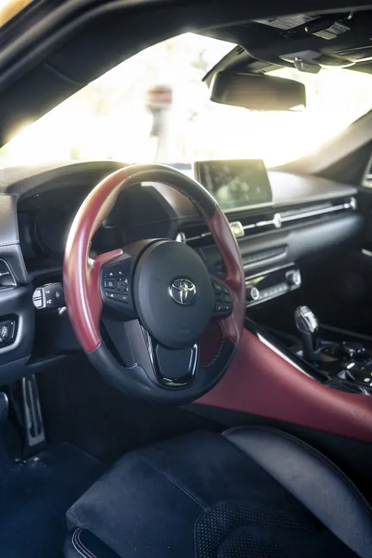 Toyota GR Supra red and black interior after detailing
